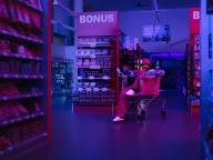Donnie sitting in a shopping cart suppermarket